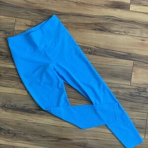 Athleta women’s perforated leggings size S bright blue never worn